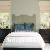 master bedroom with blue pillows